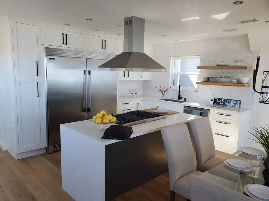 AI-generated concept: remodeled kitchen with island and range hood