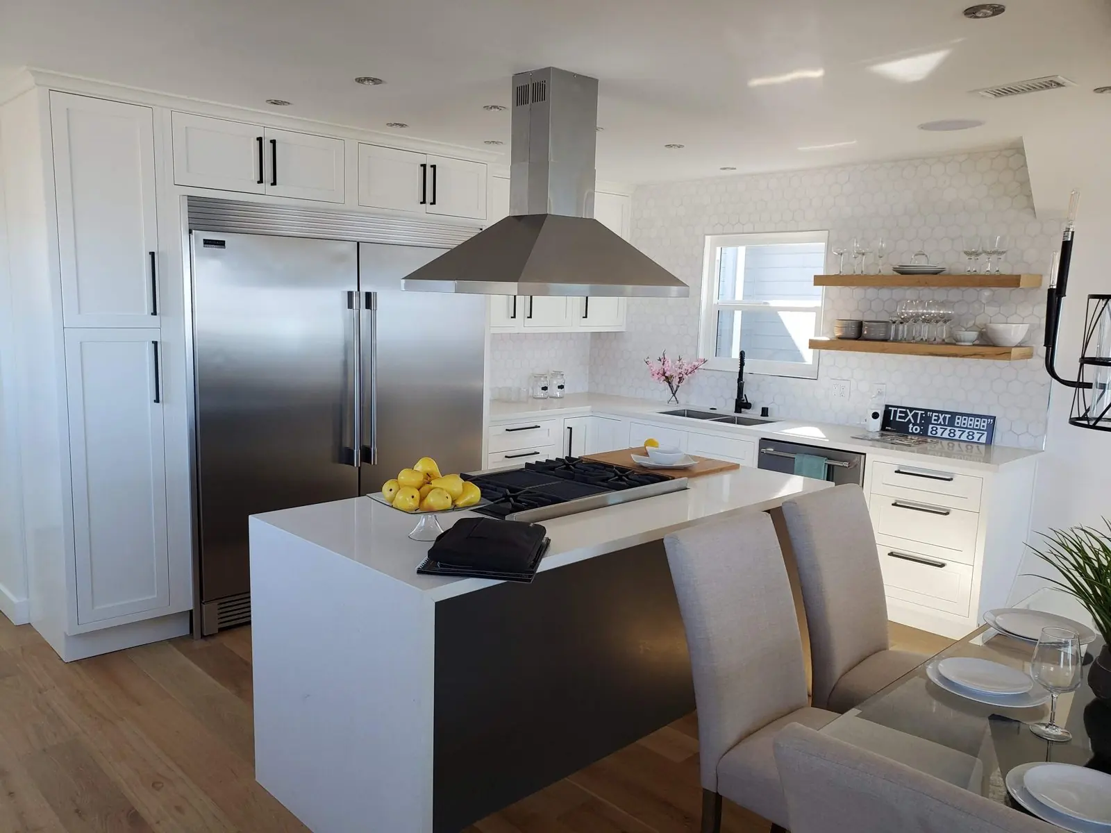 Kitchen remodel with an island and range hood