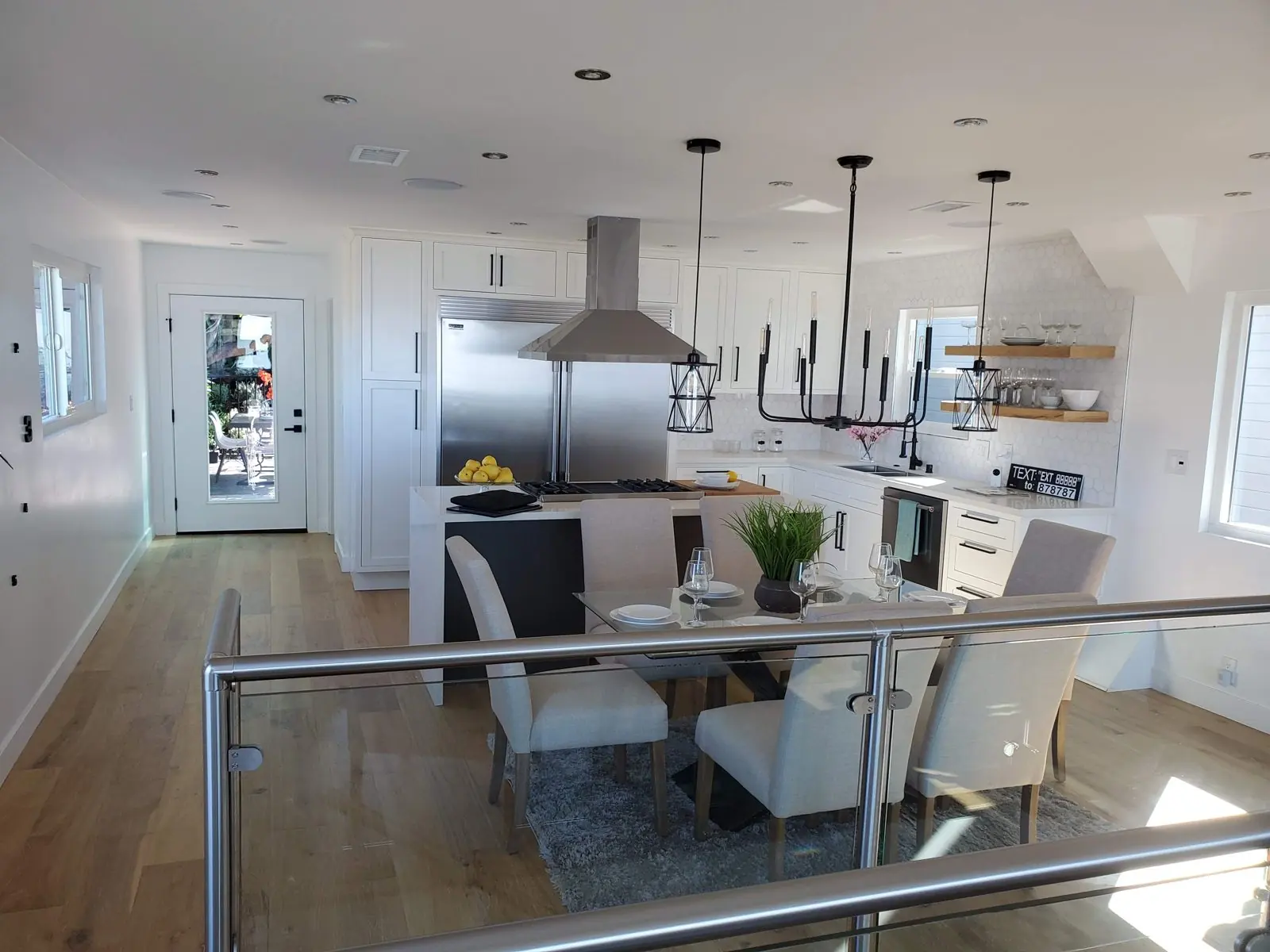 Open Plan Kitchen And Dining Kitchen Remodel by Dollhouse Construction Inc. project photo